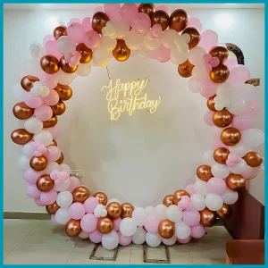 Elegant Pink & Rose Gold Balloon Arch Birthday Decor in Dubai